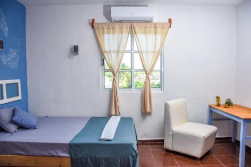 Departamentos Cerca De Ferry Holbox Hotel Exterior foto