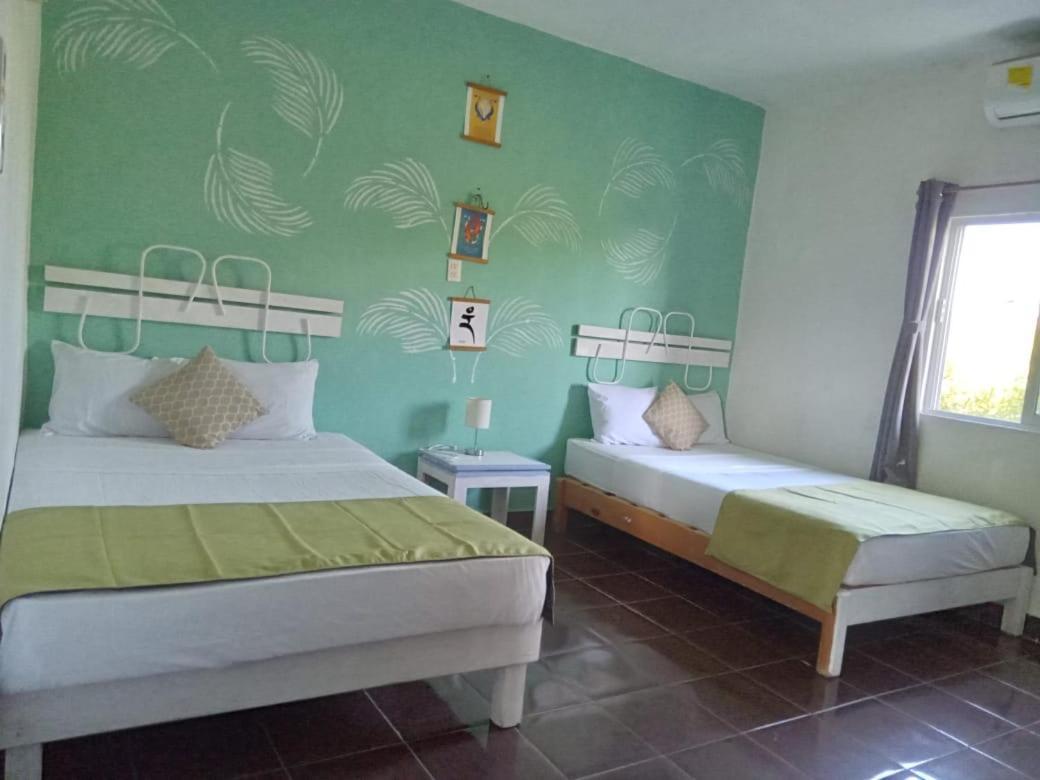 Departamentos Cerca De Ferry Holbox Hotel Exterior foto
